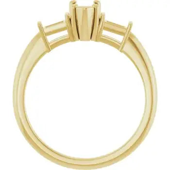 Gold engagement ring setting with vertical rectangular center stone holder and tapered side stone accents.
