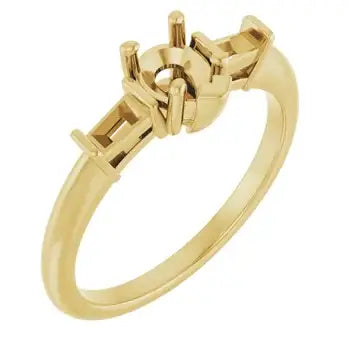 Gold ring with geometric pear-shaped stone setting and decorative side accents.