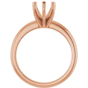 Rose gold solitaire engagement ring setting with open pear-shaped stone head and polished band.