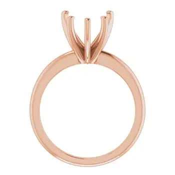 Rose gold solitaire ring setting with four-prong head for heart-shaped stone.