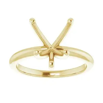 Gold-toned solitaire ring setting with V-shaped prongs for heart-shaped stone.