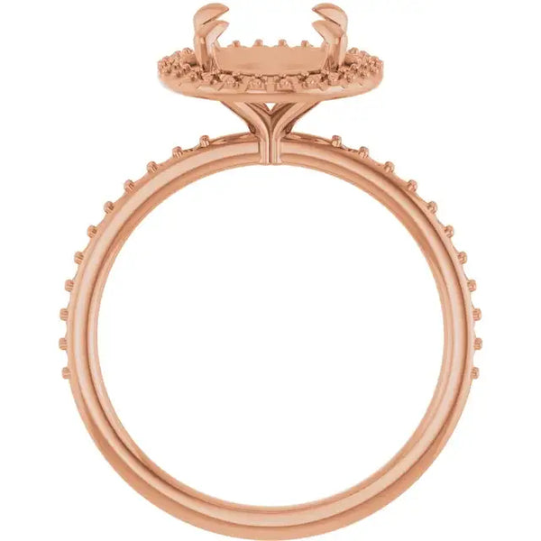 Rose gold engagement ring setting with halo design and small accent stones around the band.