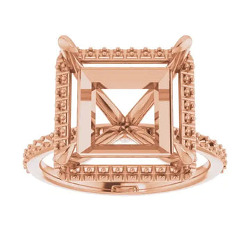 Rose gold halo engagement ring setting with square stone holder and decorative detailing on band and frame.