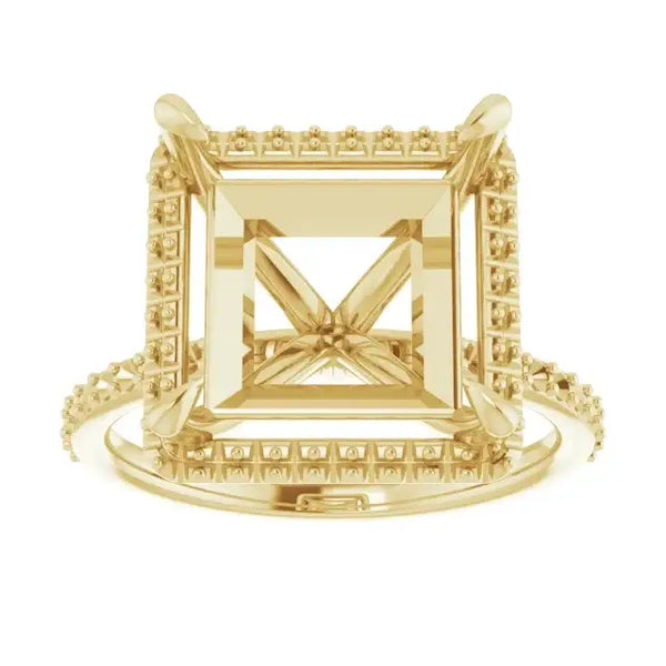 Yellow gold halo engagement ring setting with square stone mount and decorative side accents.