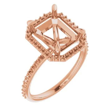 Rose gold halo engagement ring setting with emerald-cut stone head and textured band.