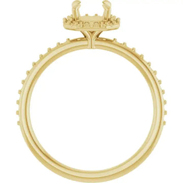 Gold engagement ring setting with halo design and small accent stones around band, empty center for asscher stone.