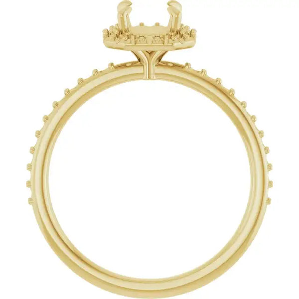 Gold engagement ring setting with halo design and small accent stones around band, empty center for asscher stone.