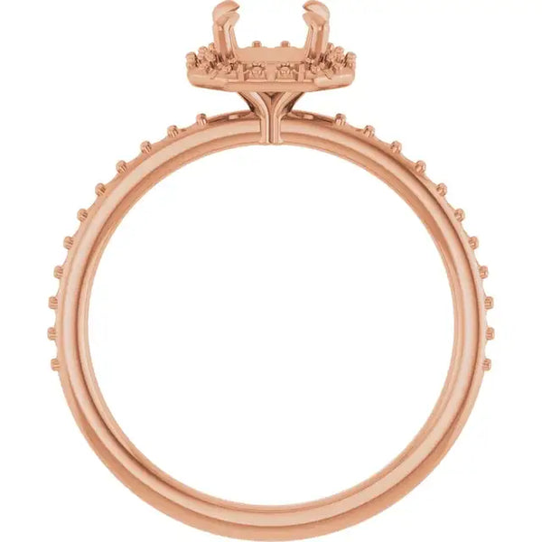 Rose gold engagement ring setting with halo crown top and small accent stones along the band.