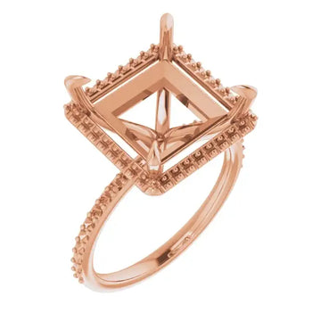Rose gold engagement ring setting with square cushion halo design and diamond-studded band.