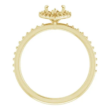 Yellow gold halo engagement ring setting with small diamonds around the band and halo, designed for heart-shaped stones.