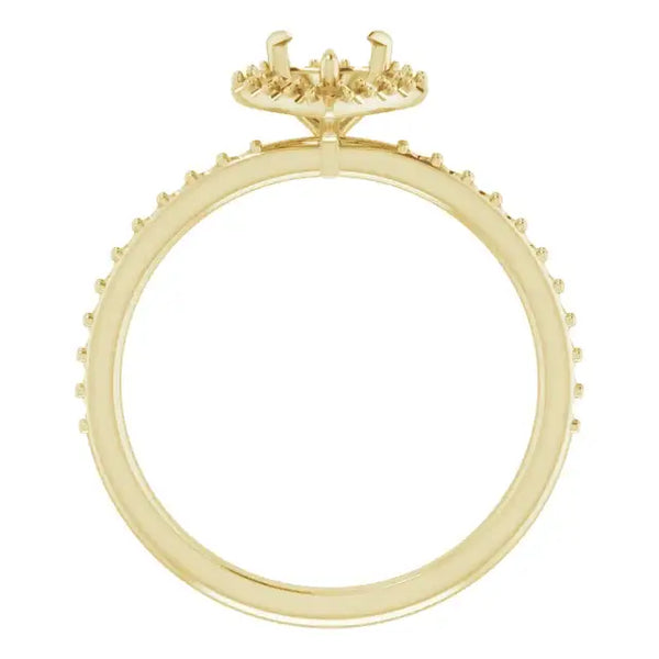 Yellow gold halo engagement ring setting with small diamonds around the band and halo, designed for heart-shaped stones.