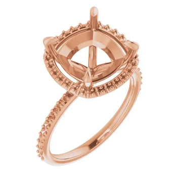 Rose gold halo engagement ring setting with cushion-shaped center stone seat and decorative accent bands.