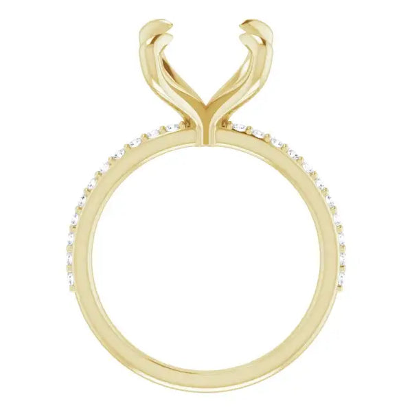 Gold engagement ring setting with curved prongs and diamond accents around the band.