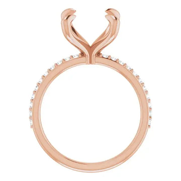 Rose gold engagement ring setting with curved prongs and diamond-accented band, designed for oval stones.