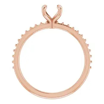 Rose gold engagement ring setting with prong head and diamond-accented band, shown from above.