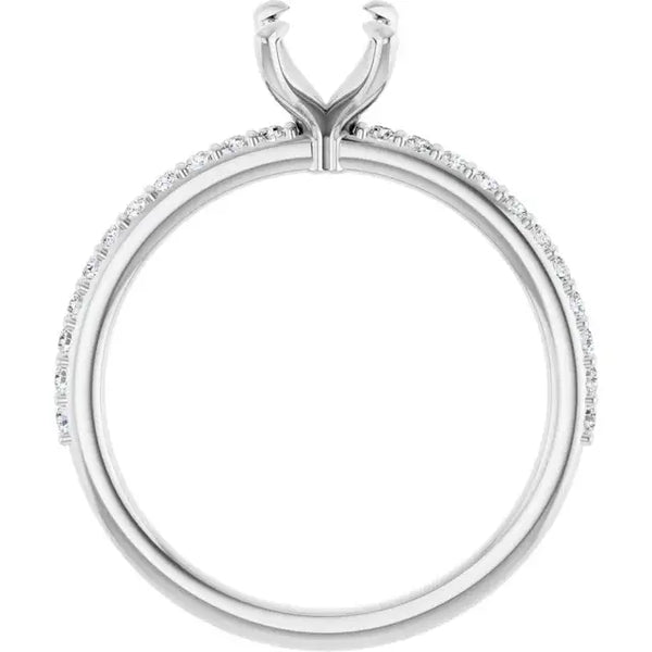 White gold engagement ring setting with V-shaped prongs and diamond accents along the band.