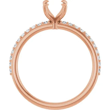 Rose gold ring setting with V-shaped prongs and round diamonds along the band.