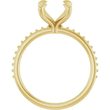 Yellow gold engagement ring setting with curved split prongs and diamond-set shoulders for oval stones.