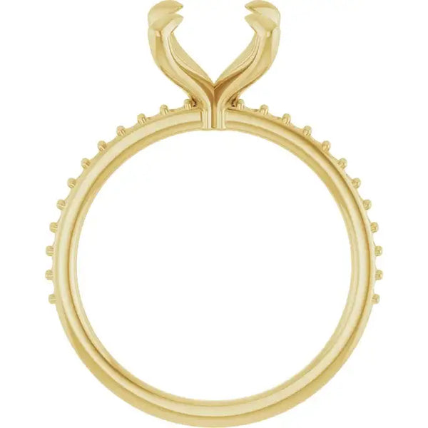 Yellow gold engagement ring setting with curved split prongs and diamond-set shoulders for oval stones.