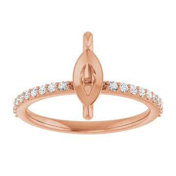 Rose gold ring setting with marquise-shaped center stone holder and round accent diamonds along the band.