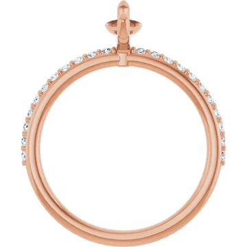 Rose gold engagement ring setting with small round diamonds set along the band and a cross motif on top.