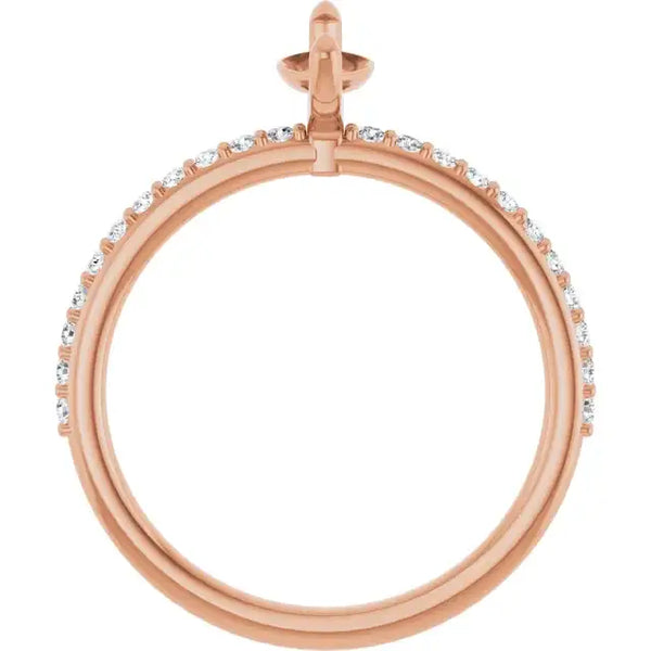Rose gold engagement ring setting with small round diamonds set along the band and a cross motif on top.