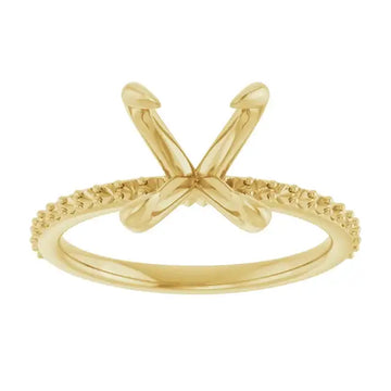 Gold engagement ring setting with X-shaped prongs and textured band, sized for oval stones.