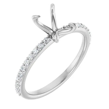 White metal engagement ring setting with curved prongs and diamond accents along the band.