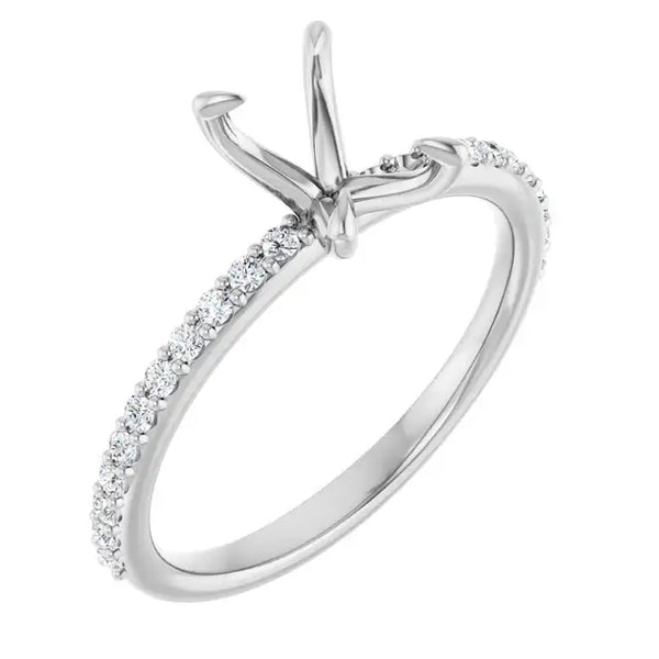 White metal engagement ring setting with curved prongs and diamond accents along the band.