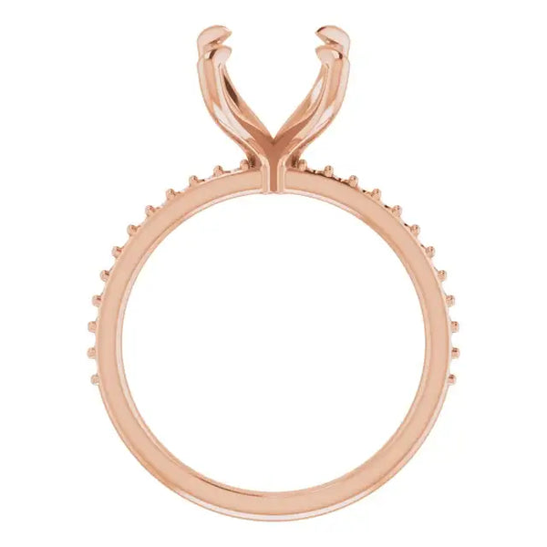Rose gold engagement ring setting with square stone holder and diamond accents along the band.