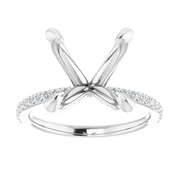Silver engagement ring setting with crossed prongs and diamond-accented band, designed for asscher cut stones.