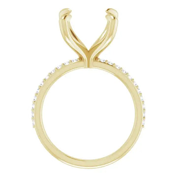 Yellow gold engagement ring setting with curved prongs and diamond accents along the band.