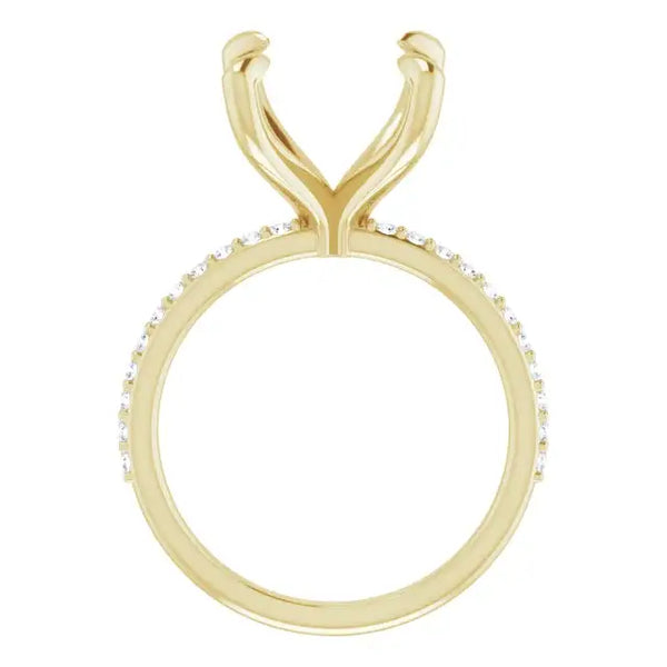 Yellow gold engagement ring setting with curved prongs and diamond accents along the band.