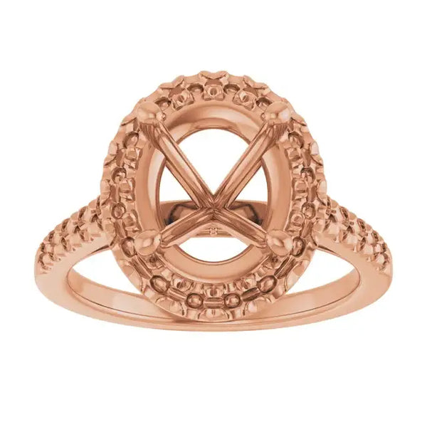 Rose gold engagement ring setting with ornate beaded halo frame for oval stones.