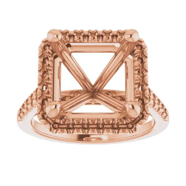 Rose gold ring setting with ornate square halo and X-cross center design for asscher-cut stones.