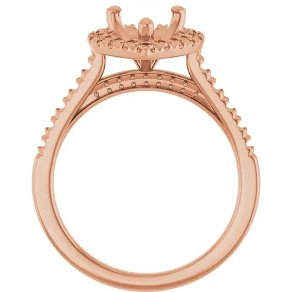 Rose gold engagement ring setting with ornate angel-wing shoulders and diamond accents along the band.