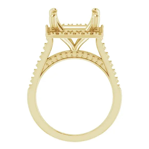 Yellow gold engagement ring setting with decorative accents on band and squared stone holder.