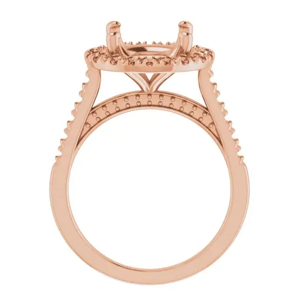 Rose gold engagement ring setting with decorative beaded accents and angular shoulders, sized for round stones.