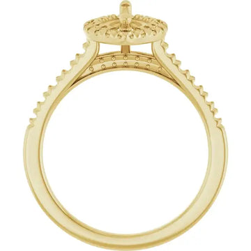 Yellow gold engagement ring setting with textured halo and accent stones along the band, designed for marquise stone.
