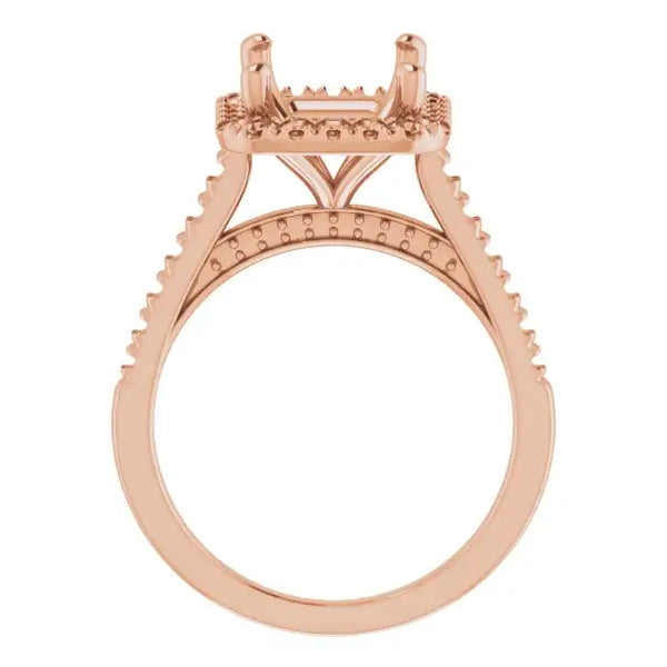 Rose gold engagement ring setting with decorative accents and empty center stone seat, shown from front view.