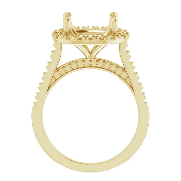 Gold engagement ring setting with cushion stone mount, decorative beaded accents on band and halo.