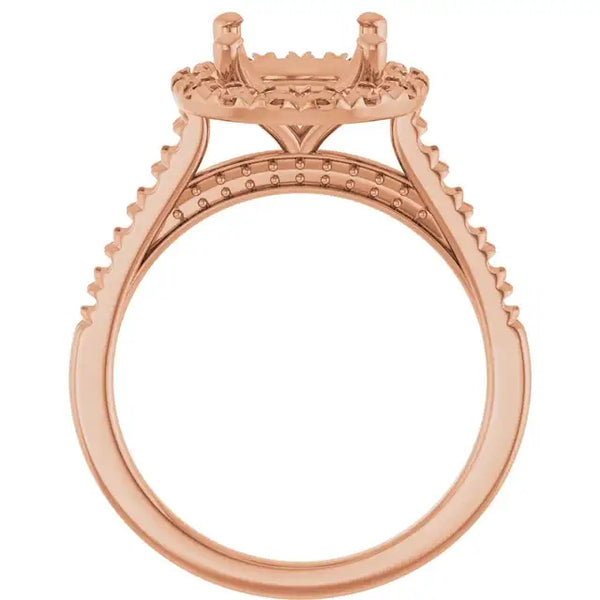 Rose gold engagement ring setting with ornate shoulders, small accent stones, and oval stone holder.