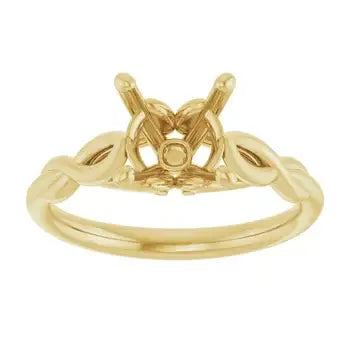 Gold solitaire engagement ring setting with empty round stone cup and curved band.