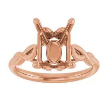 Rose gold solitaire engagement ring setting with oval stone mount and decorative shoulder details, front view.