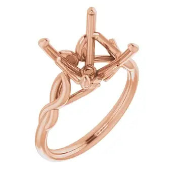 Rose gold solitaire engagement ring setting with geometric four-prong head and twisted band detail.