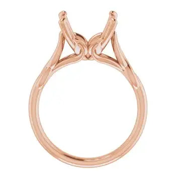 Rose gold solitaire ring setting with curved prongs, empty center stone seat, viewed from above.