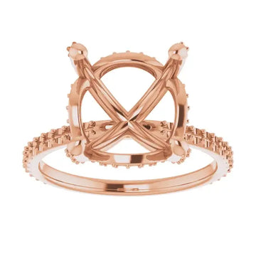 Rose gold engagement ring setting with crossed halo band and cushion stone holder, shown from front view.