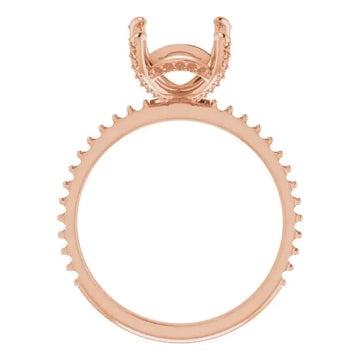 Rose gold engagement ring setting with hidden halo design and decorative prong band for emerald stone.