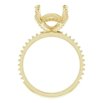 Gold engagement ring setting with hidden halo design and decorative prongs around the band for cushion-cut stones.
