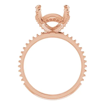 Rose gold engagement ring setting with hidden halo design and decorative prongs around the band.